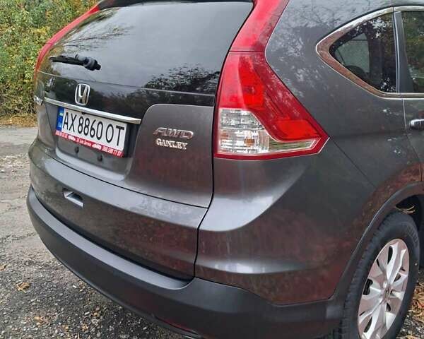Хонда СРВ 2014 в Полтаве на Automoto.ua Серый Хонда СРВ, объемом двигателя 2.36 л и пробегом 149 тыс. км за 15500 $, фото 10 на Automoto.ua