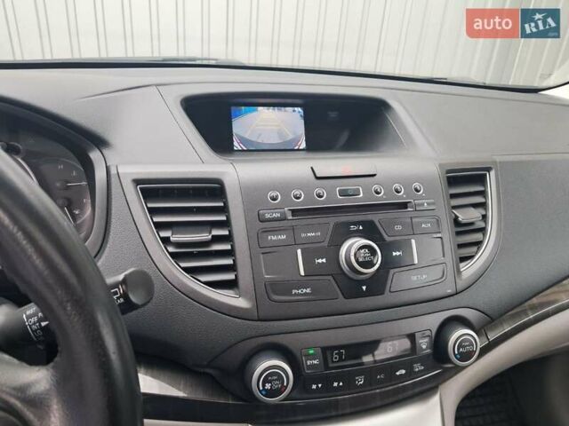 Хонда СРВ 2014 в Полтаве на Automoto.ua Серый Хонда СРВ, объемом двигателя 2.36 л и пробегом 149 тыс. км за 15500 $, фото 30 на Automoto.ua