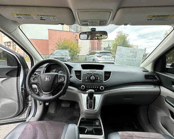 Хонда СРВ 2014 в Полтаве на Automoto.ua Серый Хонда СРВ, объемом двигателя 2.35 л и пробегом 189 тыс. км за 13500 $, фото 10 на Automoto.ua