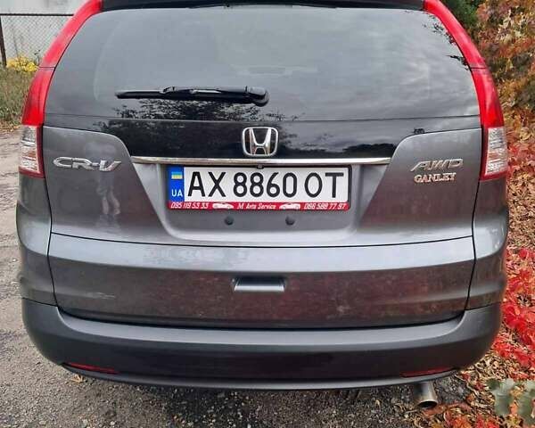 Хонда СРВ 2014 в Полтаве на Automoto.ua Серый Хонда СРВ, объемом двигателя 2.36 л и пробегом 149 тыс. км за 15500 $, фото 12 на Automoto.ua