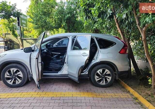 Сірий Хонда СРВ, об'ємом двигуна 2.36 л та пробігом 104 тис. км за 14000 $, фото 2 на Automoto.ua