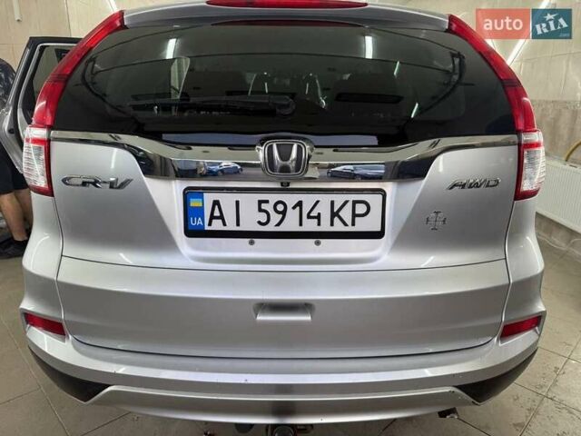 Серый Хонда СРВ, объемом двигателя 2.35 л и пробегом 235 тыс. км за 15750 $, фото 1 на Automoto.ua