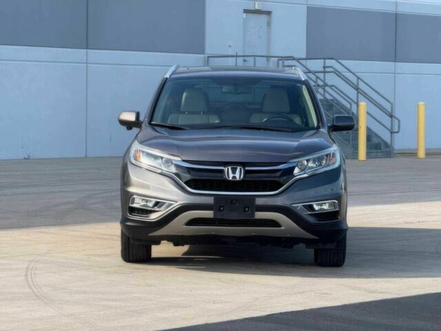 Серый Хонда СРВ, объемом двигателя 2.4 л и пробегом 76 тыс. км за 10100 $, фото 1 на Automoto.ua