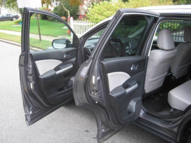 Хонда СРВ 2015 в Львове на Automoto.ua Серый Хонда СРВ, объемом двигателя 2.4 л и пробегом 75 тыс. км за 4100 $, фото 12 на Automoto.ua