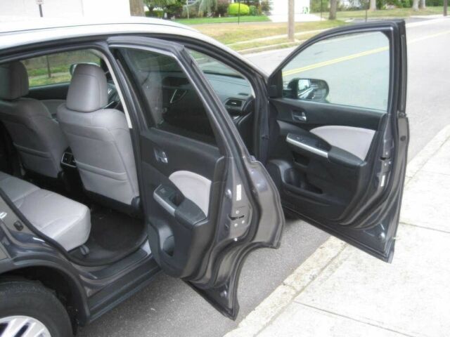 Хонда СРВ 2015 в Львове на Automoto.ua Серый Хонда СРВ, объемом двигателя 2.4 л и пробегом 75 тыс. км за 4100 $, фото 13 на Automoto.ua