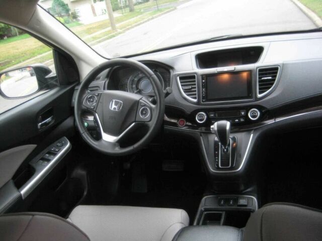 Хонда СРВ 2015 в Львове на Automoto.ua Серый Хонда СРВ, объемом двигателя 2.4 л и пробегом 75 тыс. км за 4100 $, фото 7 на Automoto.ua