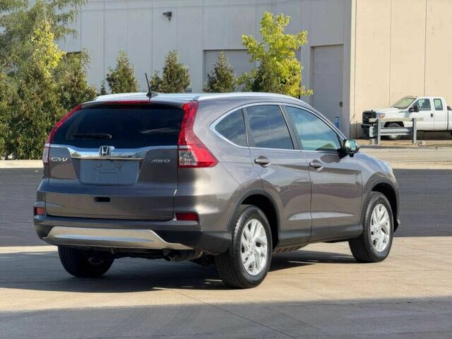 Серый Хонда СРВ, объемом двигателя 2.4 л и пробегом 76 тыс. км за 10100 $, фото 5 на Automoto.ua