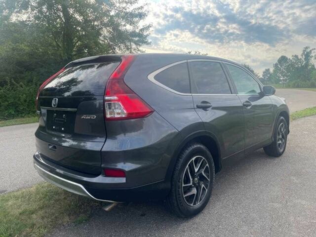 Серый Хонда СРВ, объемом двигателя 2.4 л и пробегом 73 тыс. км за 7100 $, фото 6 на Automoto.ua