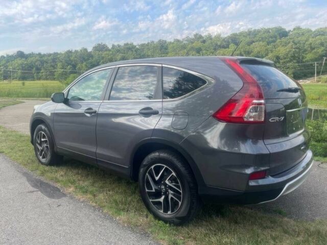 Серый Хонда СРВ, объемом двигателя 2.4 л и пробегом 73 тыс. км за 7100 $, фото 4 на Automoto.ua