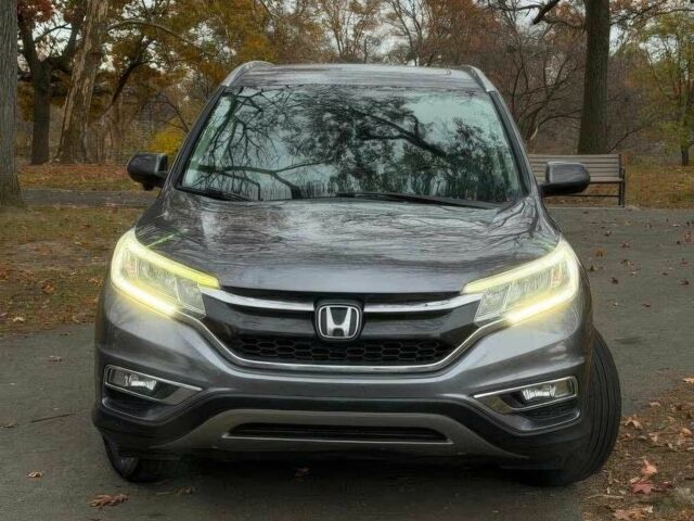 Серый Хонда СРВ, объемом двигателя 2.4 л и пробегом 77 тыс. км за 9000 $, фото 1 на Automoto.ua