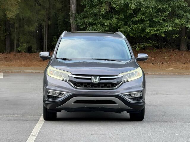 Серый Хонда СРВ, объемом двигателя 2.4 л и пробегом 77 тыс. км за 10000 $, фото 1 на Automoto.ua