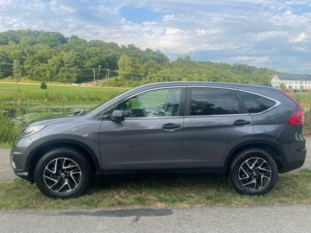 Серый Хонда СРВ, объемом двигателя 2.4 л и пробегом 73 тыс. км за 7100 $, фото 3 на Automoto.ua