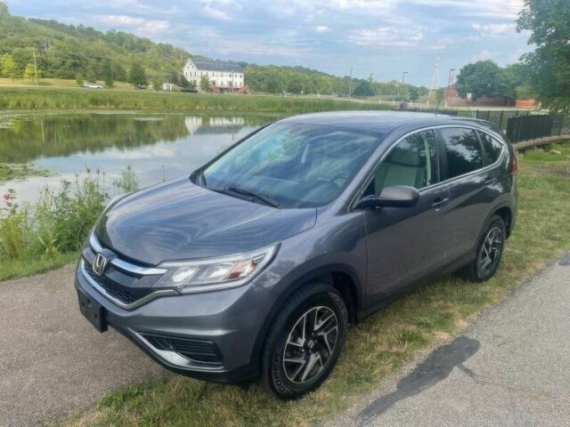 Серый Хонда СРВ, объемом двигателя 2.4 л и пробегом 73 тыс. км за 7100 $, фото 2 на Automoto.ua