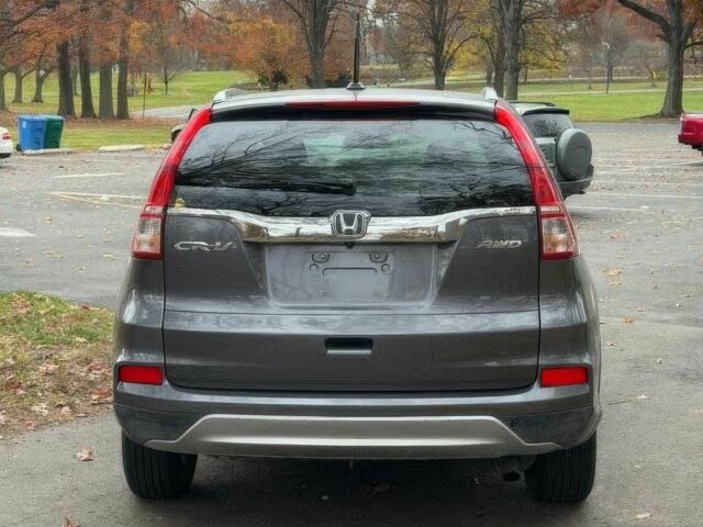 Серый Хонда СРВ, объемом двигателя 2.4 л и пробегом 77 тыс. км за 9000 $, фото 5 на Automoto.ua