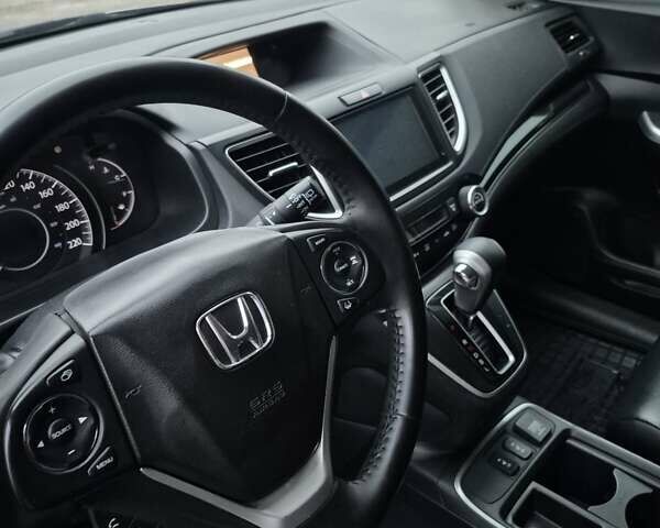 Серый Хонда СРВ, объемом двигателя 2.36 л и пробегом 135 тыс. км за 16999 $, фото 2 на Automoto.ua