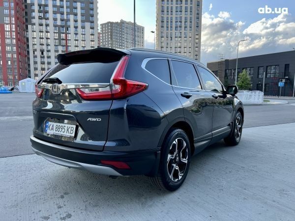 Серый Хонда СРВ, объемом двигателя 2.4 л и пробегом 99 тыс. км за 29000 $, фото 4 на Automoto.ua