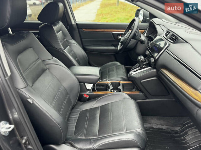 Серый Хонда СРВ, объемом двигателя 1.5 л и пробегом 172 тыс. км за 23000 $, фото 6 на Automoto.ua