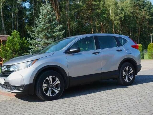 Серый Хонда СРВ, объемом двигателя 2 л и пробегом 119 тыс. км за 19200 $, фото 1 на Automoto.ua