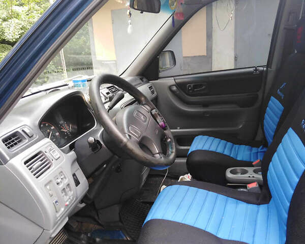 Синий Хонда СРВ, объемом двигателя 2 л и пробегом 215 тыс. км за 3000 $, фото 4 на Automoto.ua