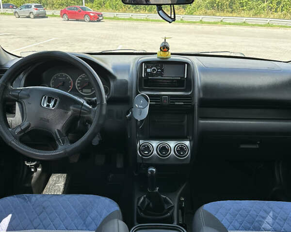 Синий Хонда СРВ, объемом двигателя 2 л и пробегом 187 тыс. км за 6200 $, фото 6 на Automoto.ua