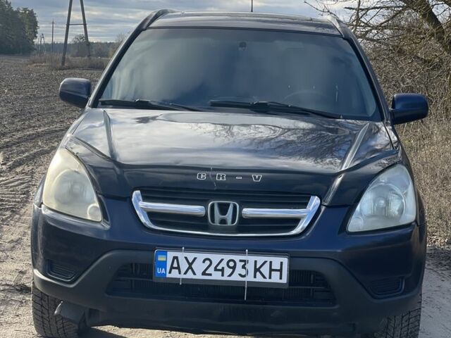 Синий Хонда СРВ, объемом двигателя 2 л и пробегом 223 тыс. км за 5750 $, фото 1 на Automoto.ua