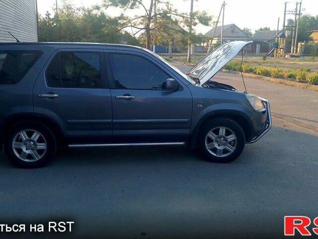 Синій Хонда СРВ, об'ємом двигуна 2 л та пробігом 250 тис. км за 6100 $, фото 1 на Automoto.ua