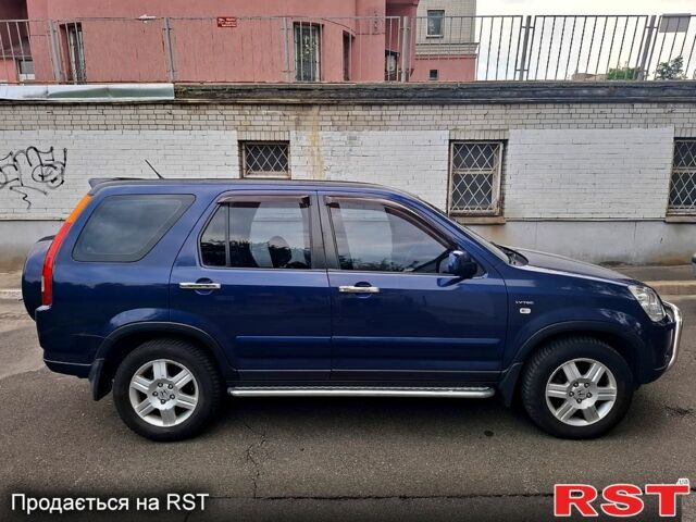 Синий Хонда СРВ, объемом двигателя 2 л и пробегом 286 тыс. км за 7300 $, фото 3 на Automoto.ua