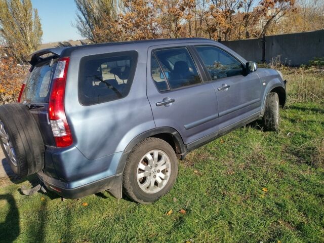 Синий Хонда СРВ, объемом двигателя 2 л и пробегом 244 тыс. км за 6400 $, фото 1 на Automoto.ua