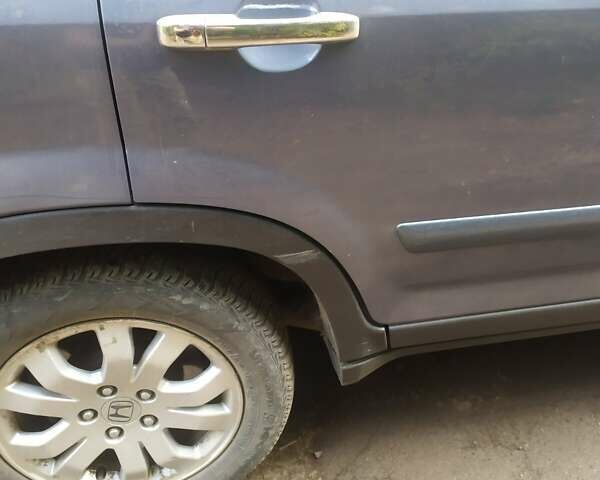 Синий Хонда СРВ, объемом двигателя 2 л и пробегом 244 тыс. км за 5000 $, фото 4 на Automoto.ua