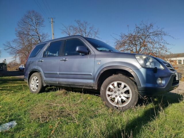 Синий Хонда СРВ, объемом двигателя 2 л и пробегом 244 тыс. км за 6400 $, фото 2 на Automoto.ua