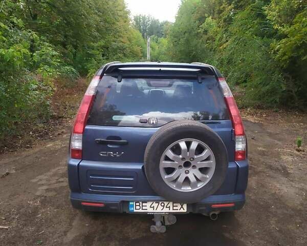 Синий Хонда СРВ, объемом двигателя 2 л и пробегом 244 тыс. км за 5000 $, фото 2 на Automoto.ua