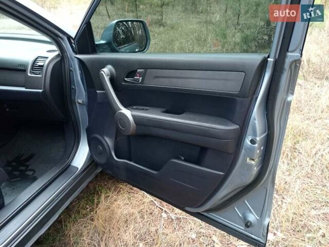Синий Хонда СРВ, объемом двигателя 2.2 л и пробегом 228 тыс. км за 10400 $, фото 6 на Automoto.ua