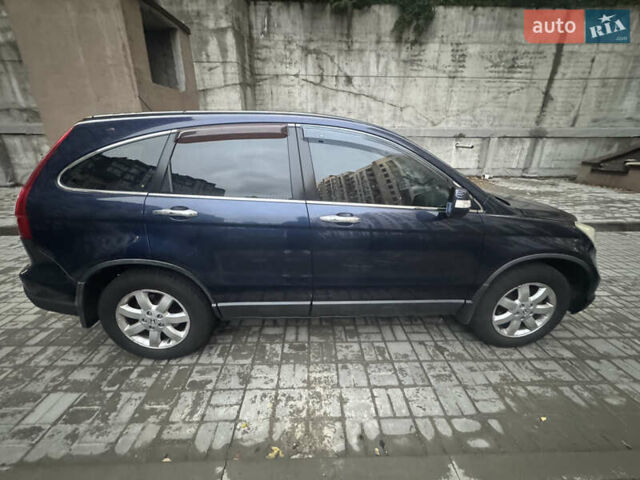 Синий Хонда СРВ, объемом двигателя 2.36 л и пробегом 245 тыс. км за 10000 $, фото 5 на Automoto.ua