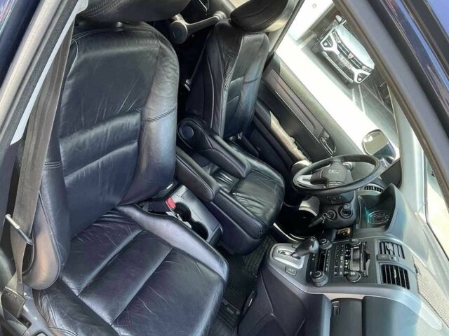 Синий Хонда СРВ, объемом двигателя 2.4 л и пробегом 195 тыс. км за 10000 $, фото 3 на Automoto.ua