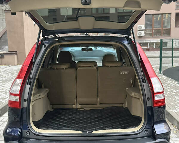 Синий Хонда СРВ, объемом двигателя 2.36 л и пробегом 245 тыс. км за 10000 $, фото 3 на Automoto.ua