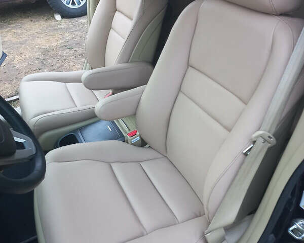 Синий Хонда СРВ, объемом двигателя 2.35 л и пробегом 214 тыс. км за 9800 $, фото 2 на Automoto.ua