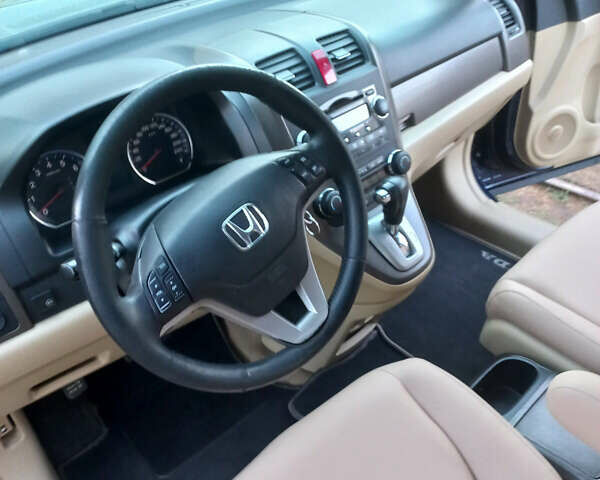 Синий Хонда СРВ, объемом двигателя 2.35 л и пробегом 214 тыс. км за 9800 $, фото 1 на Automoto.ua