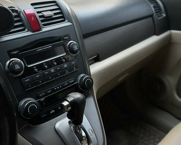 Синий Хонда СРВ, объемом двигателя 2.36 л и пробегом 245 тыс. км за 10000 $, фото 8 на Automoto.ua