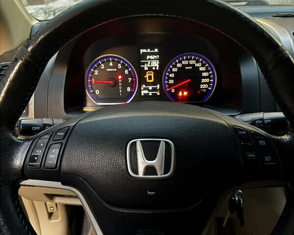 Синий Хонда СРВ, объемом двигателя 2.36 л и пробегом 245 тыс. км за 10000 $, фото 7 на Automoto.ua