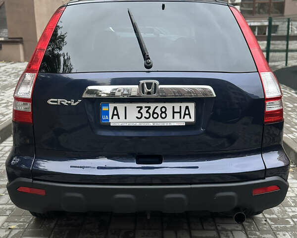 Синий Хонда СРВ, объемом двигателя 2.36 л и пробегом 245 тыс. км за 10000 $, фото 2 на Automoto.ua