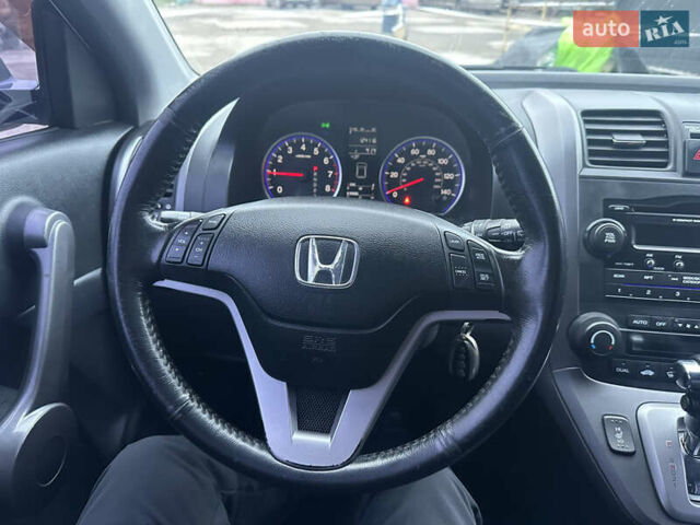 Синий Хонда СРВ, объемом двигателя 2.35 л и пробегом 198 тыс. км за 10300 $, фото 43 на Automoto.ua