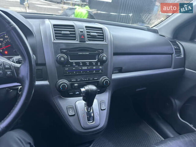 Синий Хонда СРВ, объемом двигателя 2.35 л и пробегом 198 тыс. км за 10300 $, фото 44 на Automoto.ua