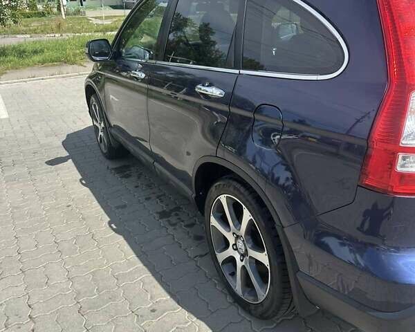 Синий Хонда СРВ, объемом двигателя 2 л и пробегом 255 тыс. км за 8750 $, фото 1 на Automoto.ua