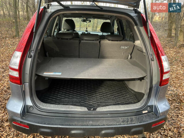 Синий Хонда СРВ, объемом двигателя 2.35 л и пробегом 318 тыс. км за 10200 $, фото 6 на Automoto.ua