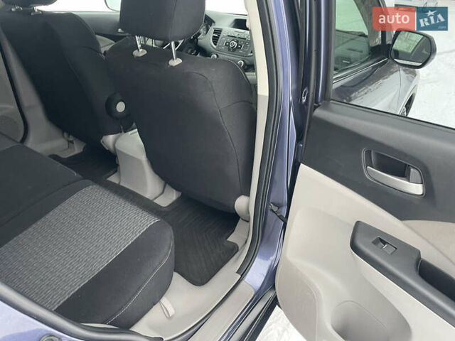 Синий Хонда СРВ, объемом двигателя 2.36 л и пробегом 203 тыс. км за 13300 $, фото 11 на Automoto.ua