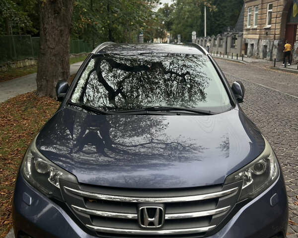Синий Хонда СРВ, объемом двигателя 2 л и пробегом 260 тыс. км за 17000 $, фото 3 на Automoto.ua