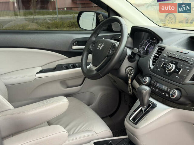 Синий Хонда СРВ, объемом двигателя 2.4 л и пробегом 250 тыс. км за 12777 $, фото 92 на Automoto.ua