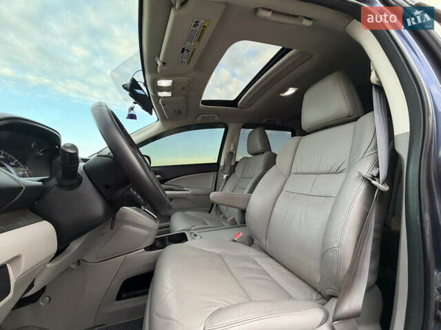 Синий Хонда СРВ, объемом двигателя 2.4 л и пробегом 250 тыс. км за 12777 $, фото 64 на Automoto.ua