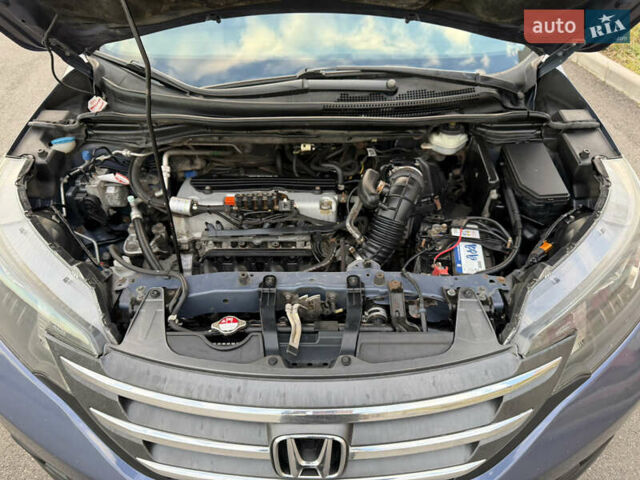 Синий Хонда СРВ, объемом двигателя 2.4 л и пробегом 250 тыс. км за 12777 $, фото 96 на Automoto.ua