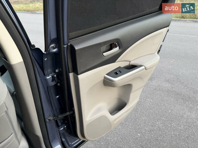 Синий Хонда СРВ, объемом двигателя 2.4 л и пробегом 250 тыс. км за 12777 $, фото 87 на Automoto.ua